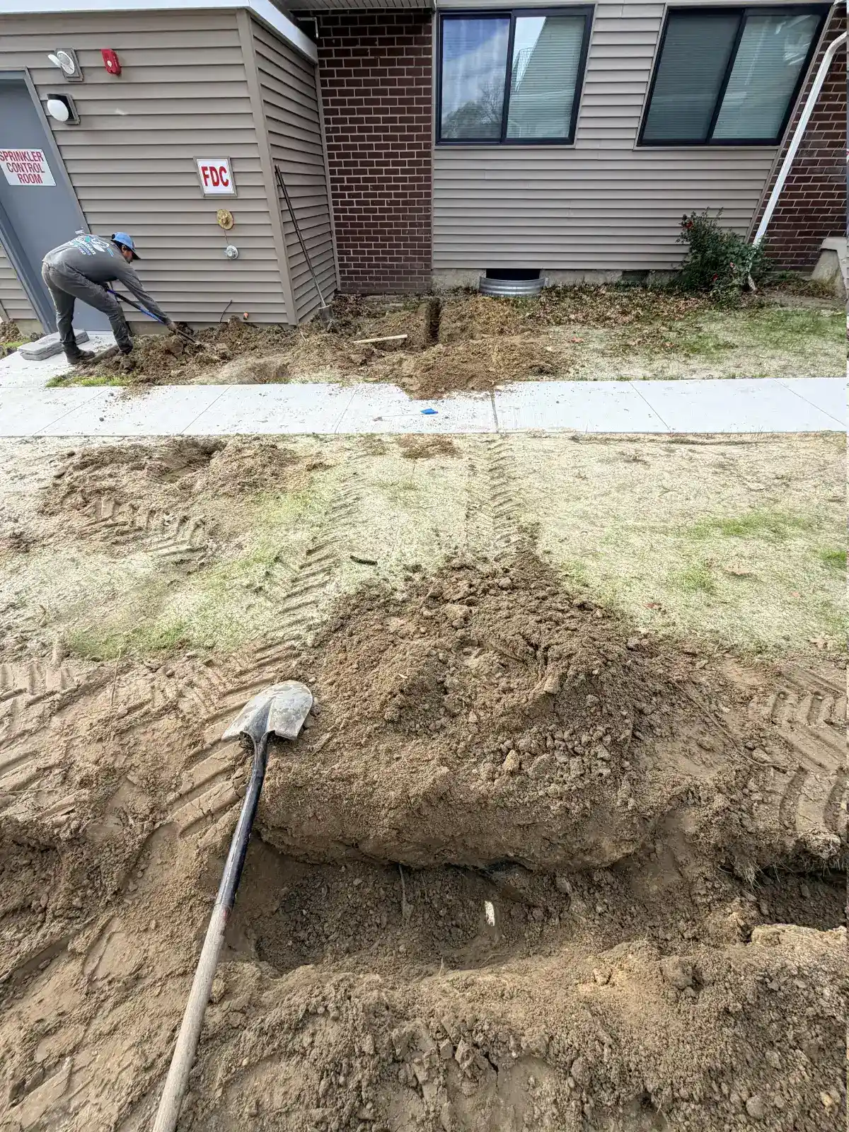 Commercial irrigation trench installation in progress