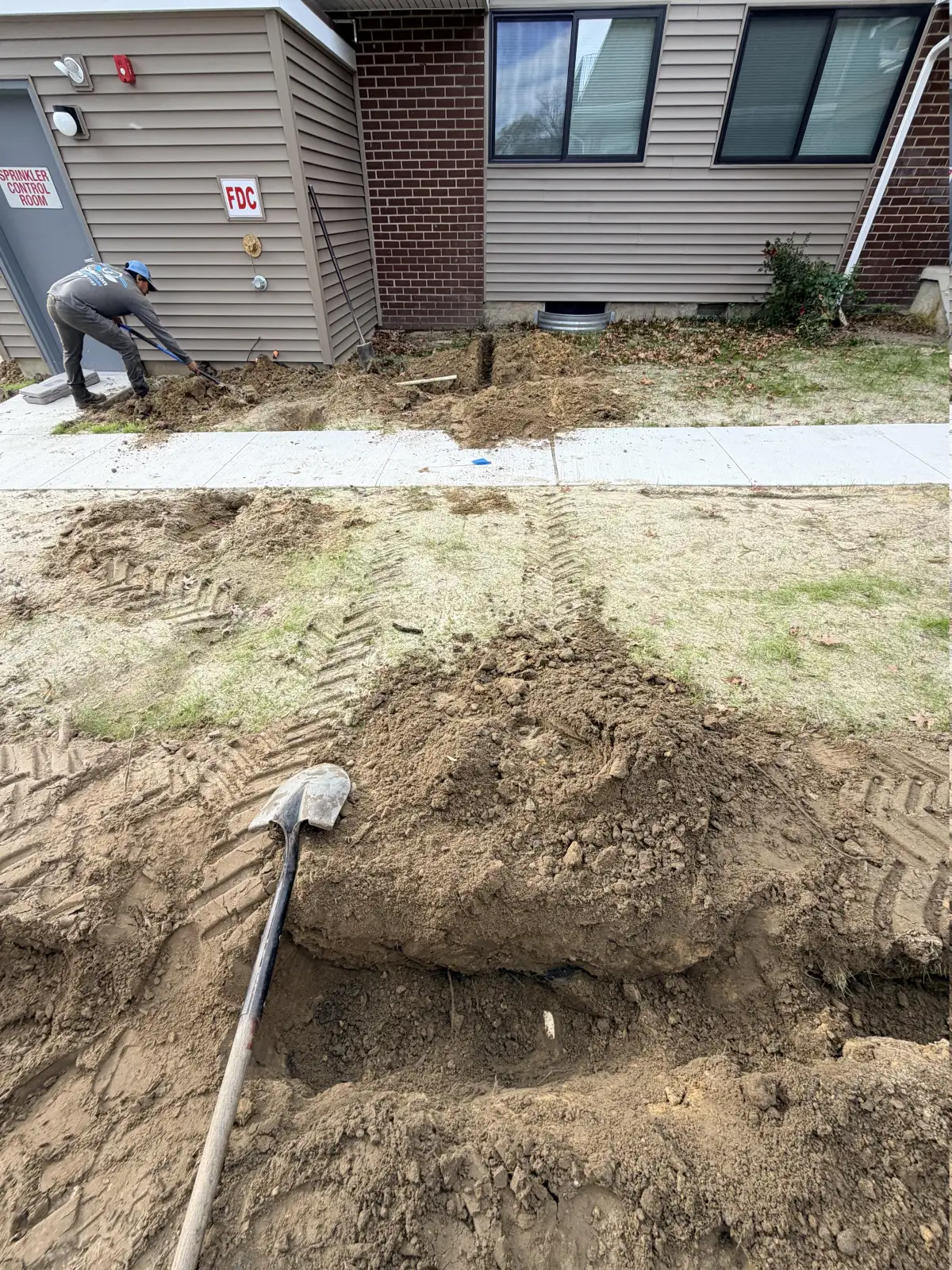 Commercial irrigation trenching installation in progress