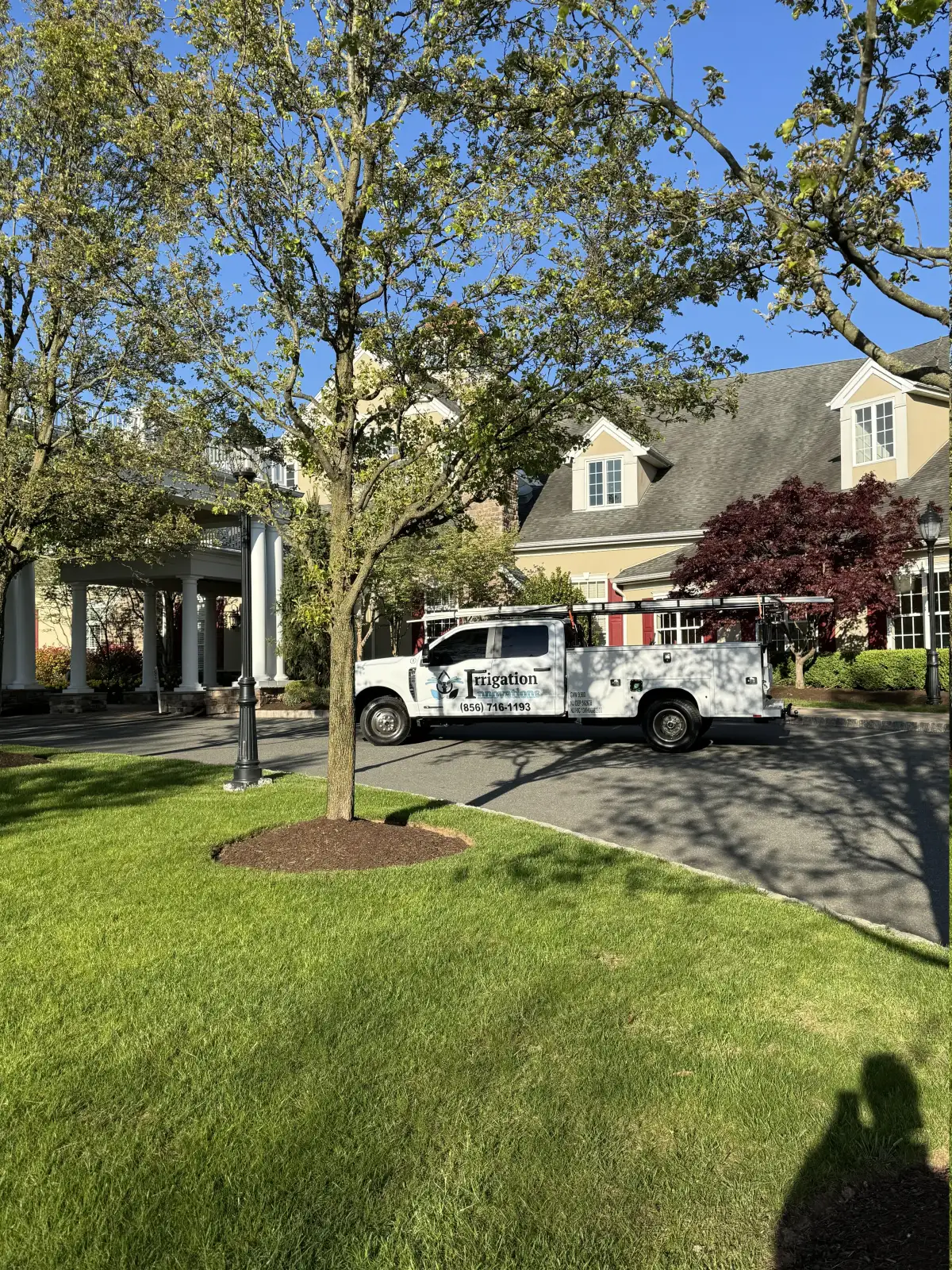 Irrigation Innovations branded service truck at luxury home in South Jersey